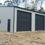 Warehouse with multiple doors — Shed kits in Gympie, QLD